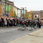 Bishop Auckland and District Pipes and Drums parading into Bishop Auckland Market Place