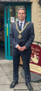 Mayor of Bishop Auckland, Councillor Sam Zair outside of The Four Clocks Centre.