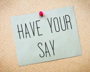 Have Your Say. Light Blue Note with a Red Drawing Pin.