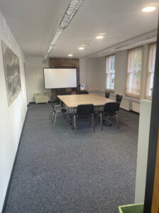 Batts Room on the ground floor. This room has a portable desktop projector and projection screen.
