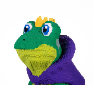 A Green Frog with a Purple Cape, made from Building Bricks.