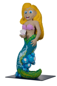 A Mermaid with a Blue and Green Tail, made from Building Bricks.